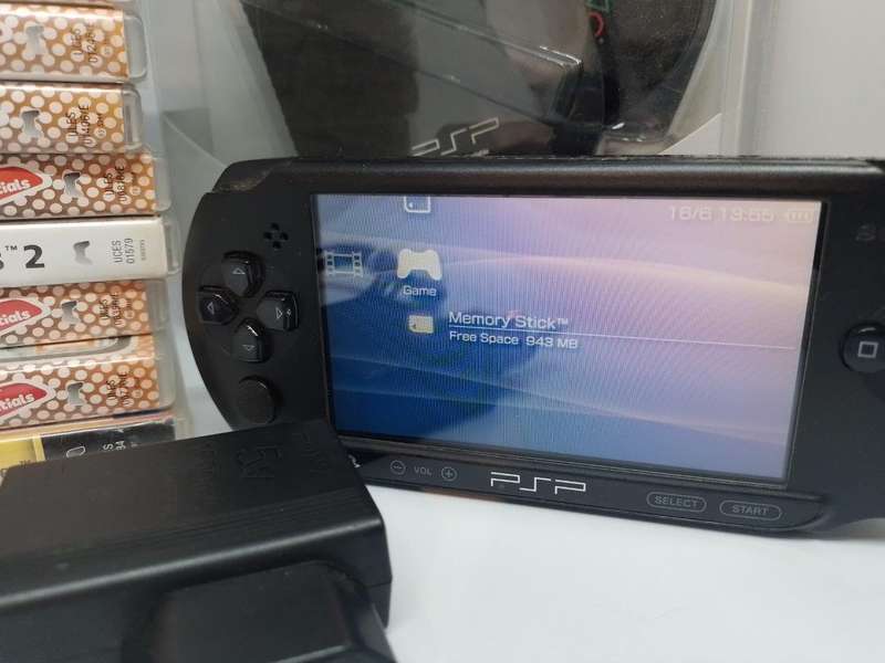 PSP Street, Starter Kit  Charger, Carry Case, 1gb Sony Card +  10 Games Bundle