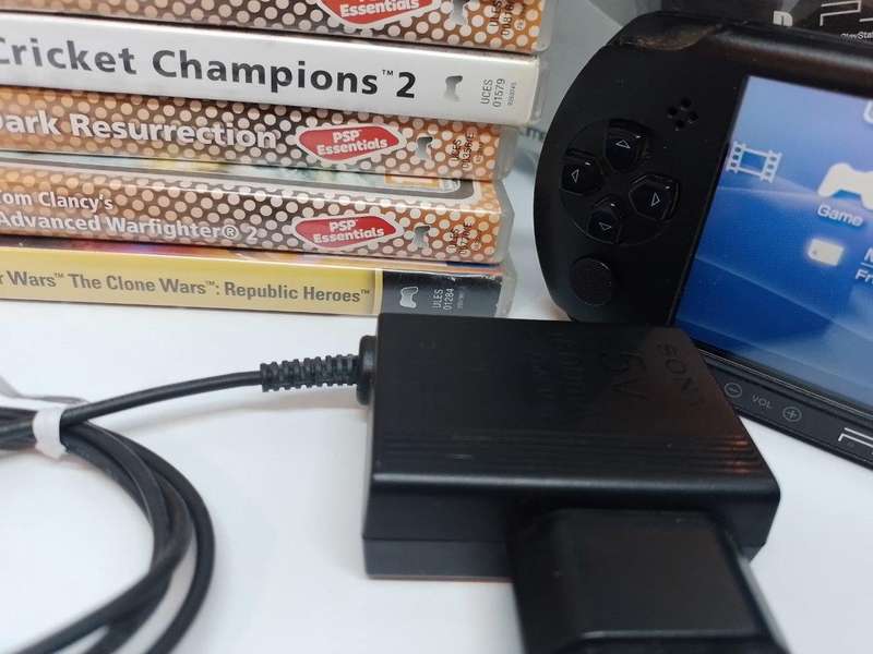 PSP Street, Starter Kit  Charger, Carry Case, 1gb Sony Card +  10 Games Bundle