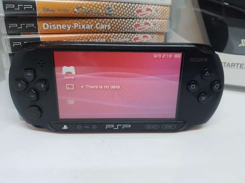 PSP Street, Starter Kit  Charger, Carry Case, 512mb Memory Card +  10 Games Bundle