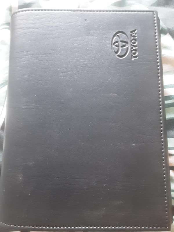 Toyota Hilux Owner`s Manual By: Toyota Motor Corporation 2012 with Toyota Black Pouch