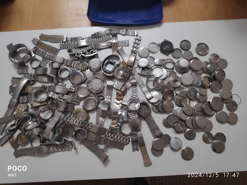 A lot of Stainless Steel Cases , casebacks and bracelets