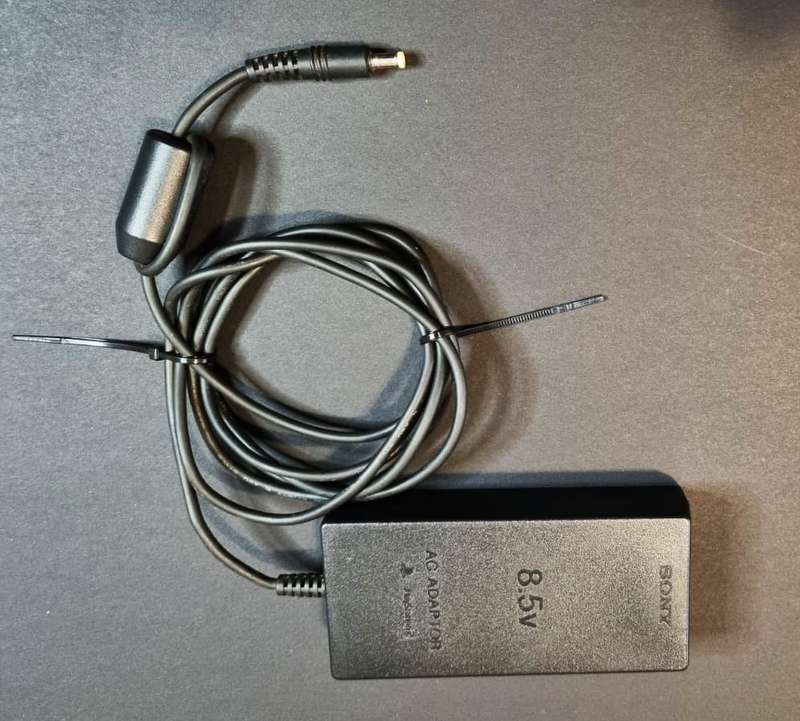 SILVER SONY PLAYSTAION 2 BUNDLE
