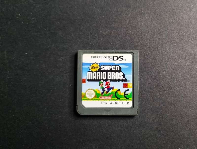 Nintendo DSi XL  Grey  Large Screens  Fully Working + New Super Mario Bros + Charger + 16GB Memor