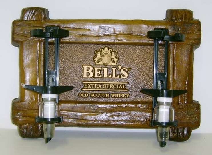 Liquor Dispensers: Bell`s Scotch Whisky with 2 Sets of Optics. Brand New. Collections Are Allowed.