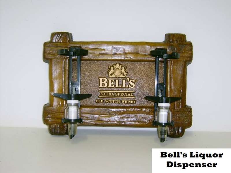 Liquor Dispensers: Bell`s Scotch Whisky with 2 Sets of Optics. Brand New. Collections Are Allowed.