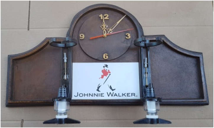 Liquor Dispenser: Johnnie Walker Scotch Whisky with 2 Optic Sets Plus A Clock. Collections Allowed.