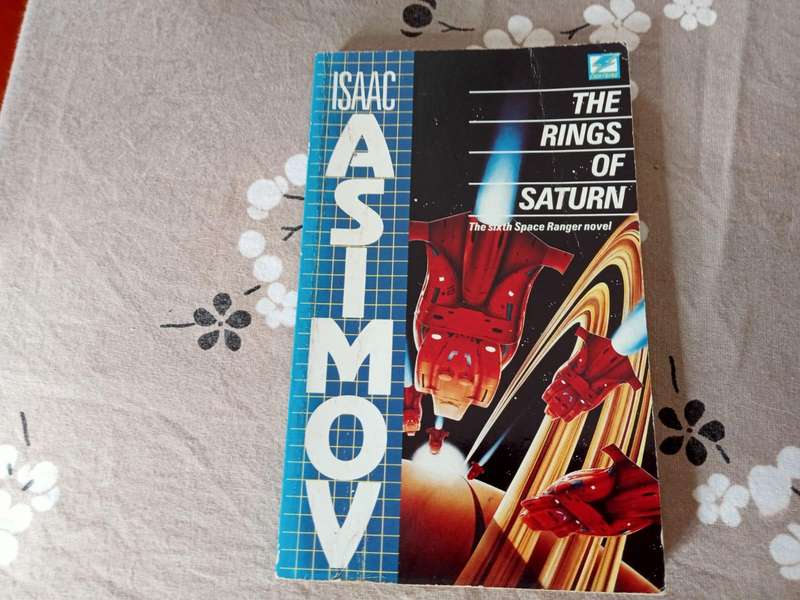 The Rings of Saturn | Isaac Asimov (Paperback)