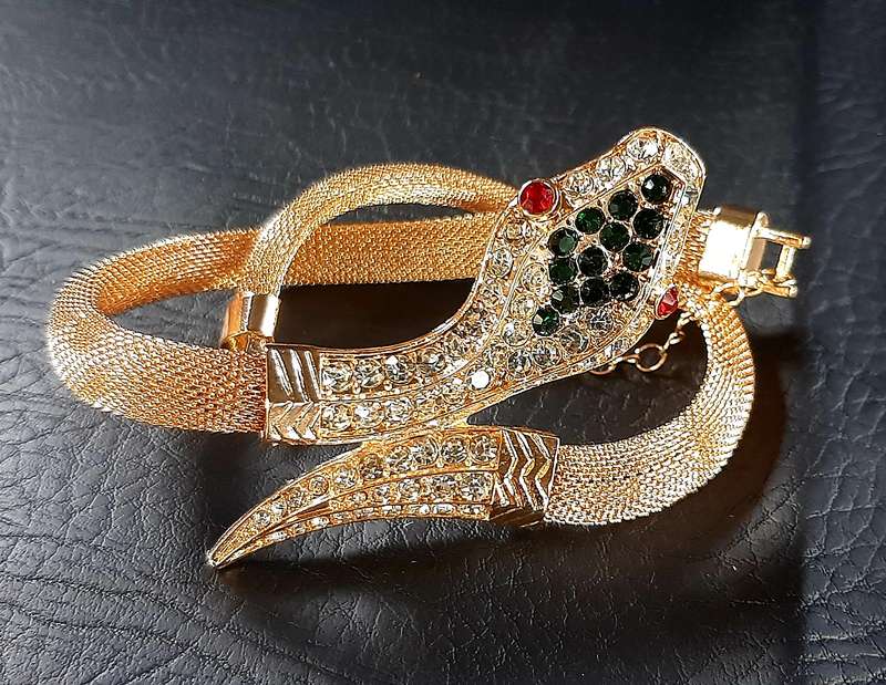 GOLDEN SERPENT CHOKER - A SYMBOL OF POWER & ELEGANCE