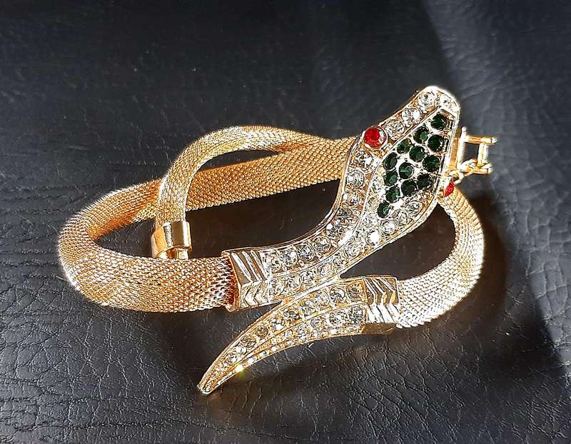 GOLDEN SERPENT CHOKER - A SYMBOL OF POWER & ELEGANCE