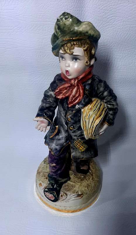 VINTAGE ITALIAN PORCELAIN FIGURINE - "THE NEWSPAPER SELLER" - HAND PAINTED AND GOLD GILDED