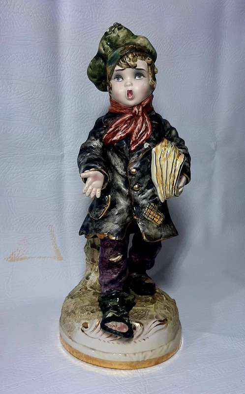 VINTAGE ITALIAN PORCELAIN FIGURINE - "THE NEWSPAPER SELLER" - HAND PAINTED AND GOLD GILDED