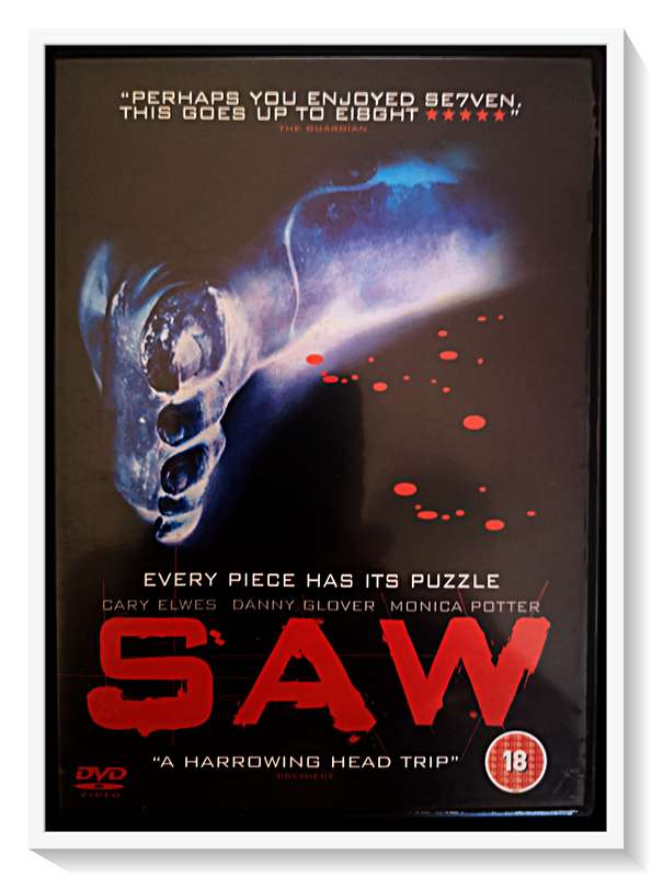 SAW I - THE ORIGNAL CULT CLASSIC - Disc and Casing in A Plus Condition (A+)
