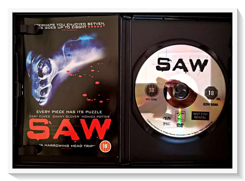 SAW I - THE ORIGNAL CULT CLASSIC - Disc and Casing in A Plus Condition (A+)