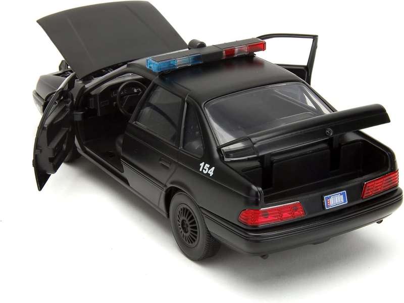 Jada 1:24 die-cast Robocop and OCP Ford Taurus.