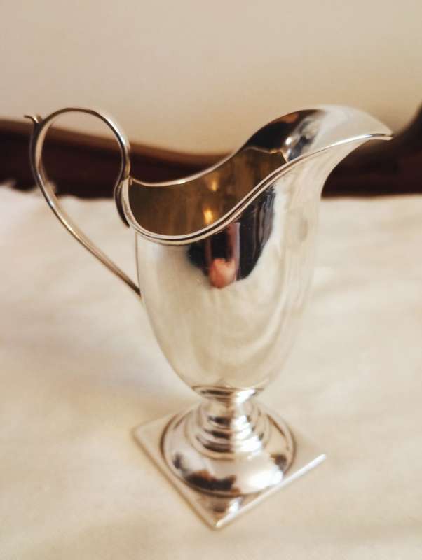 A lovely silver helmet jug in Georgian style