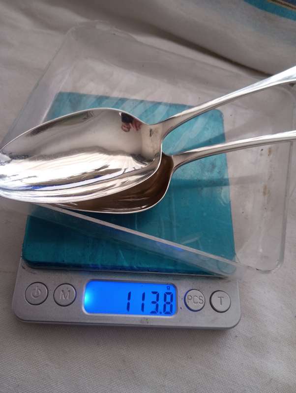 A matching pair of silver Georgian serving spoons