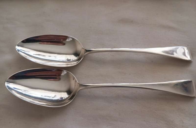 A matching pair of silver Georgian serving spoons