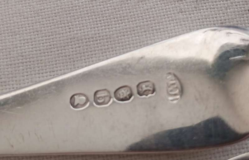 A matching pair of silver Georgian serving spoons