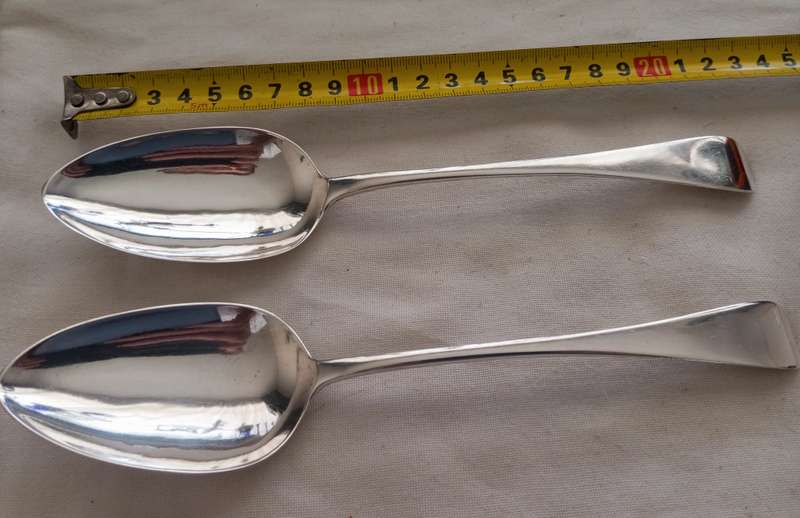 A matching pair of silver Georgian serving spoons