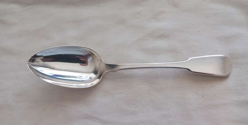 A fine silver Georgian serving spoon fiddleback1817