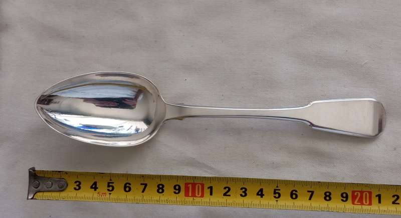 A fine silver Georgian serving spoon fiddleback1817