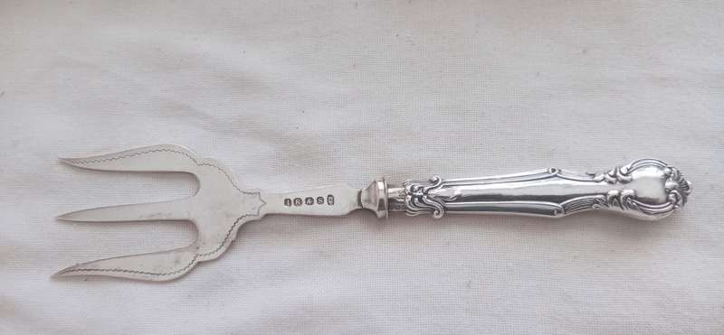 A lovely vintage silver cake fork