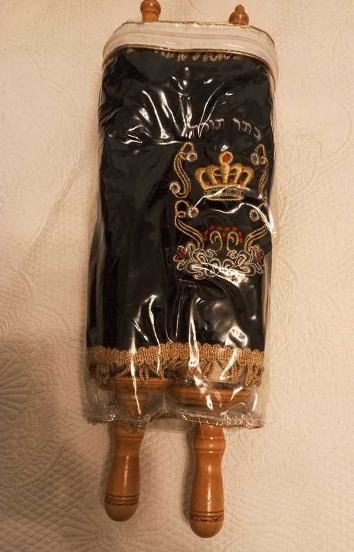 A small replica sefer Torah ( Torah scroll)