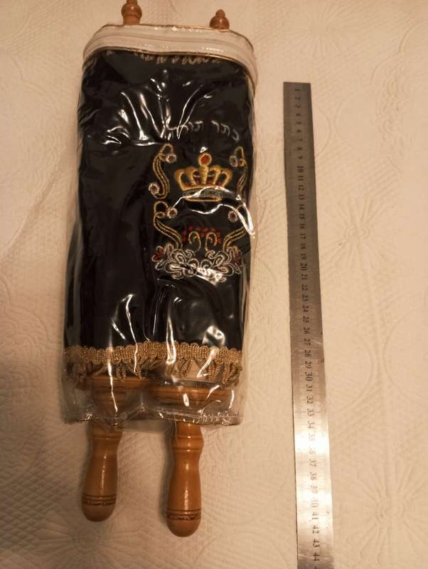 A small replica sefer Torah ( Torah scroll)