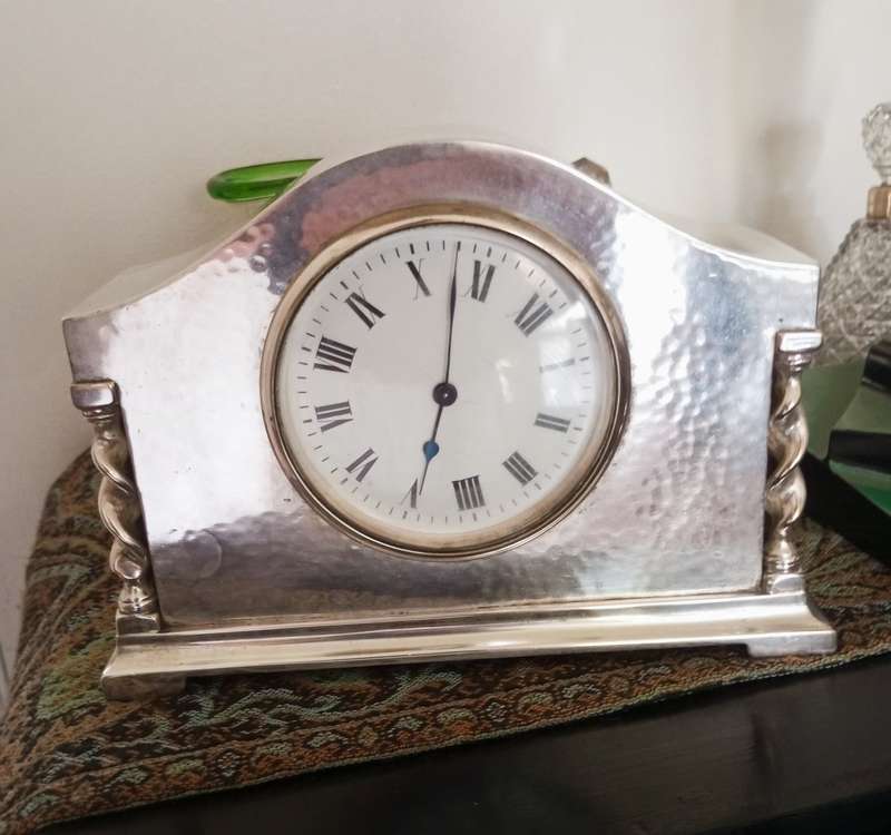 A fine silver plate vintage mantle clock in working order