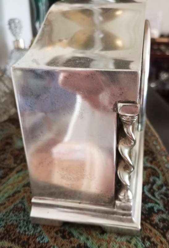 A fine silver plate vintage mantle clock in working order