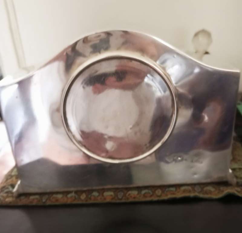 A fine silver plate vintage mantle clock in working order