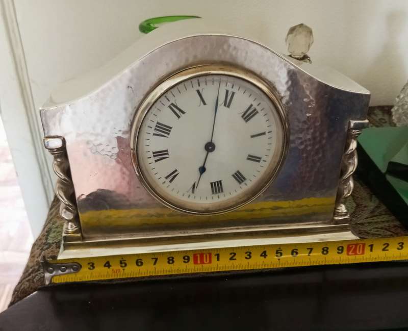 A fine silver plate vintage mantle clock in working order