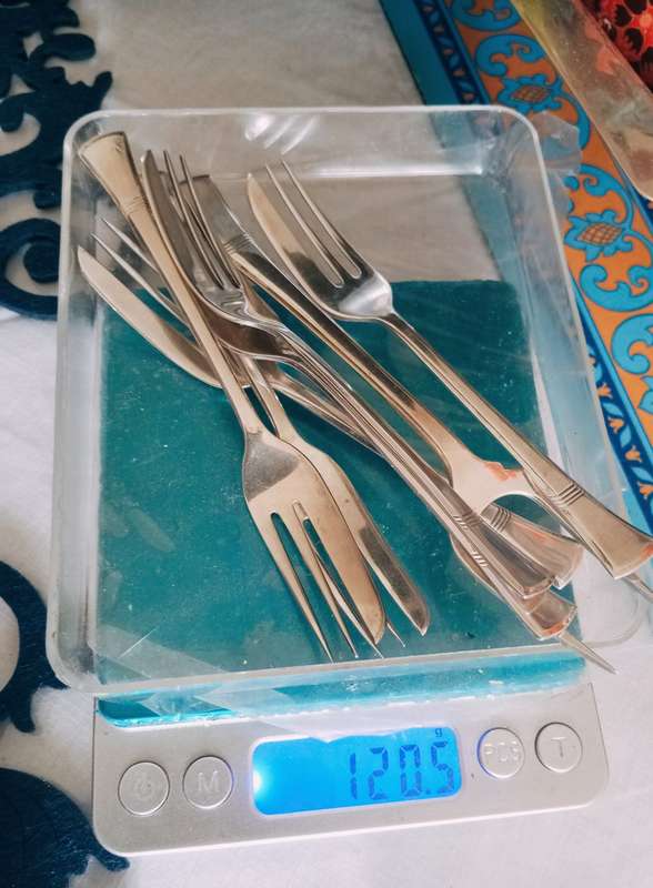 A fine boxed  set of sterling silver  cake forks