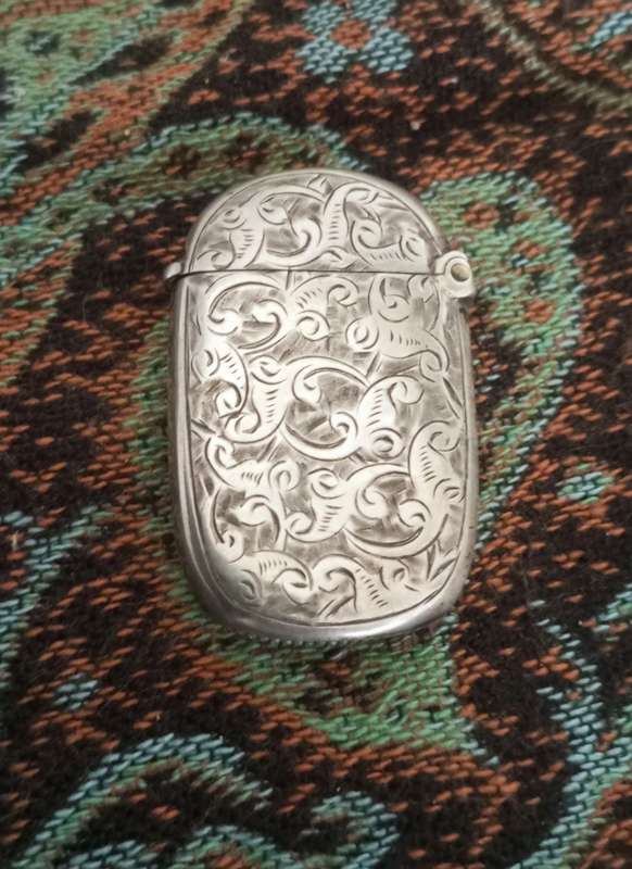 A pigmi sized engraved  silver vesta case 1898