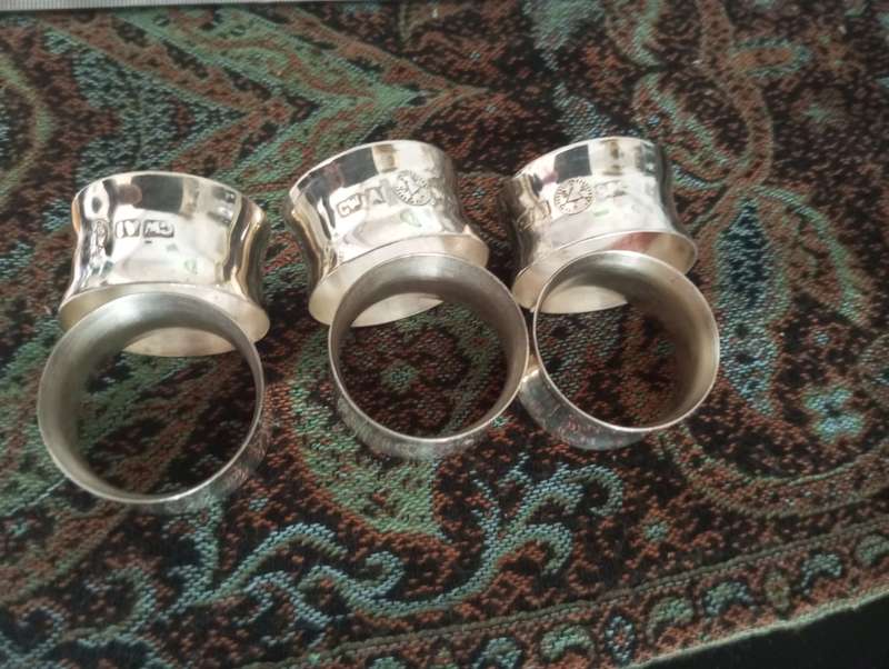 A set of fine silver plated napkin rings