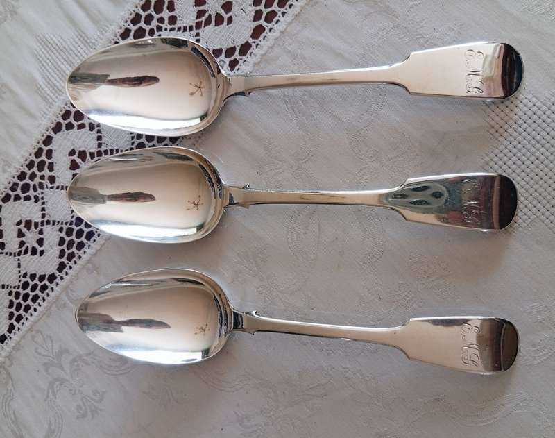 A super set of 3 Scottish Georgian silver serving spoons