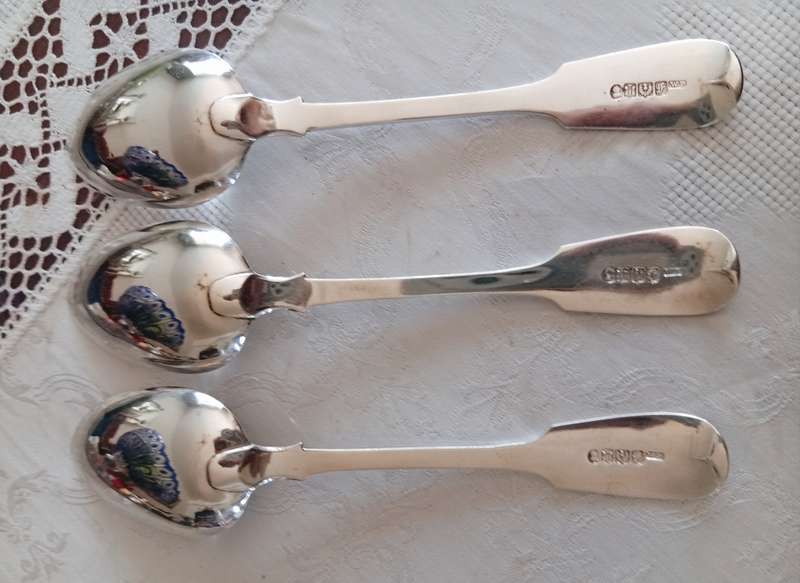A super set of 3 Scottish Georgian silver serving spoons