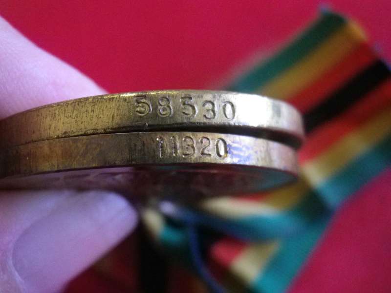 RHODESIA - 2 x ZIMBABWE INDEPENDANCE MEDALS, 1 WITHOUT RIBBON RING - NOS. 58530 AND 11320 (139)