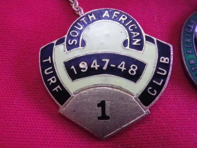 TURF CLUB BADGES - SOUTH AFRICAN TURF CLUB - 1941 MALE No1 - 1947-48 FEMALE No. 1 (MADE GAUNT)  (24)