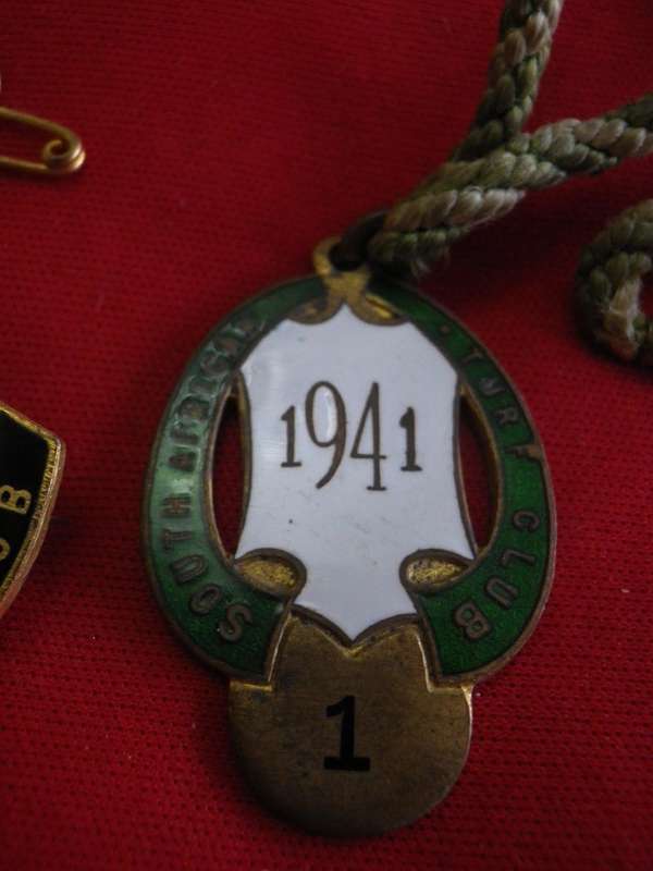 TURF CLUB BADGES - SOUTH AFRICAN TURF CLUB - 1941 MALE No1 - 1947-48 FEMALE No. 1 (MADE GAUNT)  (24)