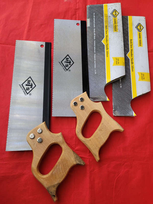 Unused 300mm wooden-handle back saw. Bid per piece.