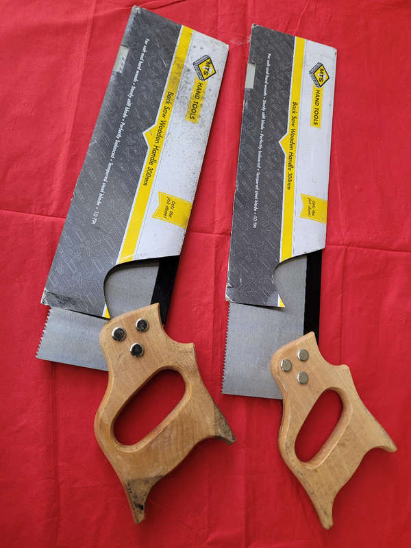 Unused 300mm wooden-handle back saw. Bid per piece.
