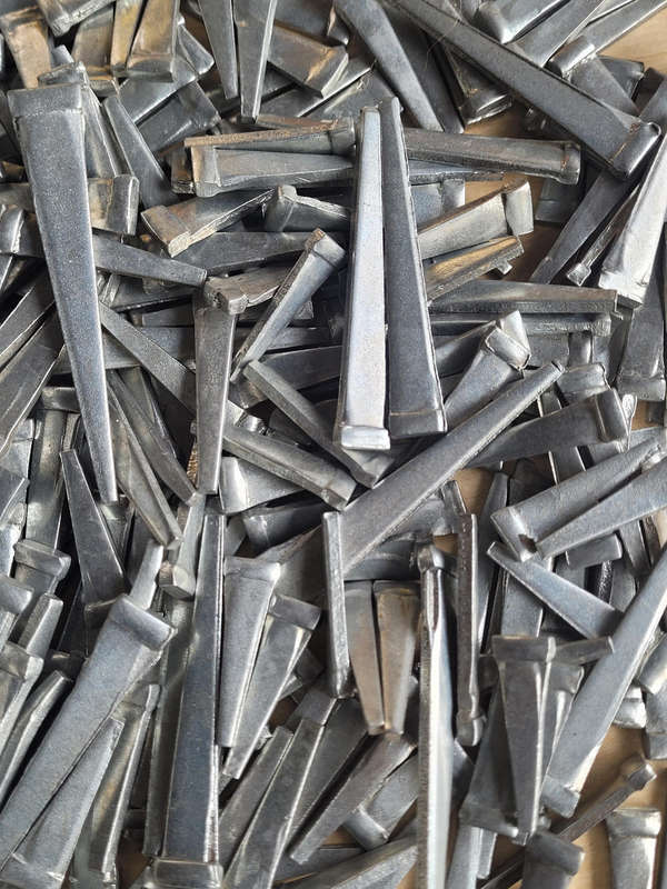 UNUSED...ASSORTED Steel Cut Masonry Nails. (Bid Per 50-Piece Pack)