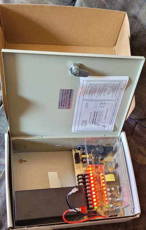 UNUSED 12v Back Up Power Supply. No Key/Screws