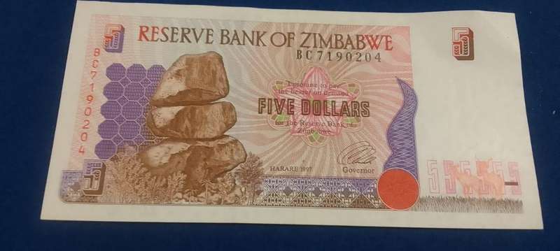 BANK OF ZIMBABWE FIVE DOLLARS -  GREAT CONDITION -1997