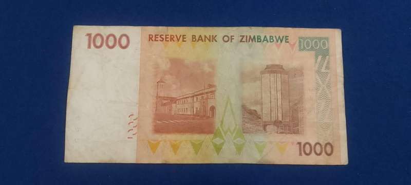 BANK OF ZIMBABWE ONE THOUSAND DOLLARS -  CIRCULATED CONDITION - 2007  A-NUMBERS -2 NOTES