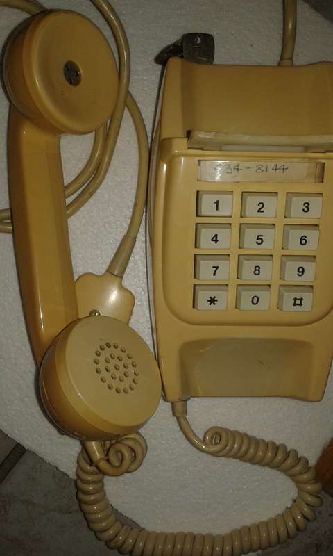 Vintage button phone - with plug and key