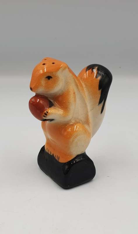 An English squirrel painted Glazed Earthenware Salt shaker Shaker circa 1936