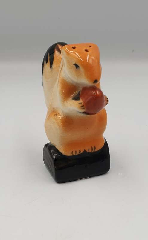 An English squirrel painted Glazed Earthenware Salt shaker Shaker circa 1936