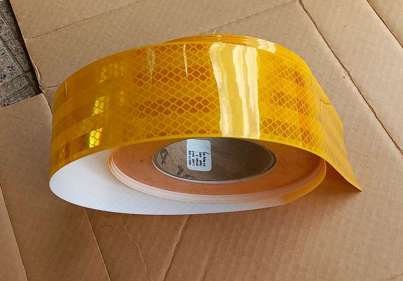 20+ metres of 55mm orange trailer reflective tape - roll